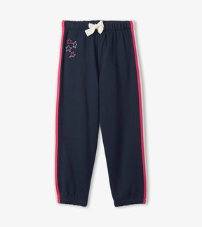 Hatley Mystic Sky navy joggers with hot-pink side stripes and white waist bow, front view