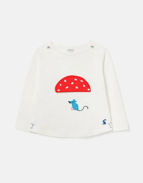 Front view of the cream Joules Harbour baby top with a red spotted mushroom and blue mouse