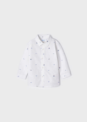 Front view of white baby boys shirt with small blue nautical print