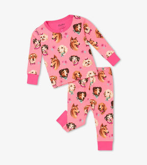 Hatley baby girl Puppy Portraits organic cotton pajama set in Pink with long sleeves and matching pants.