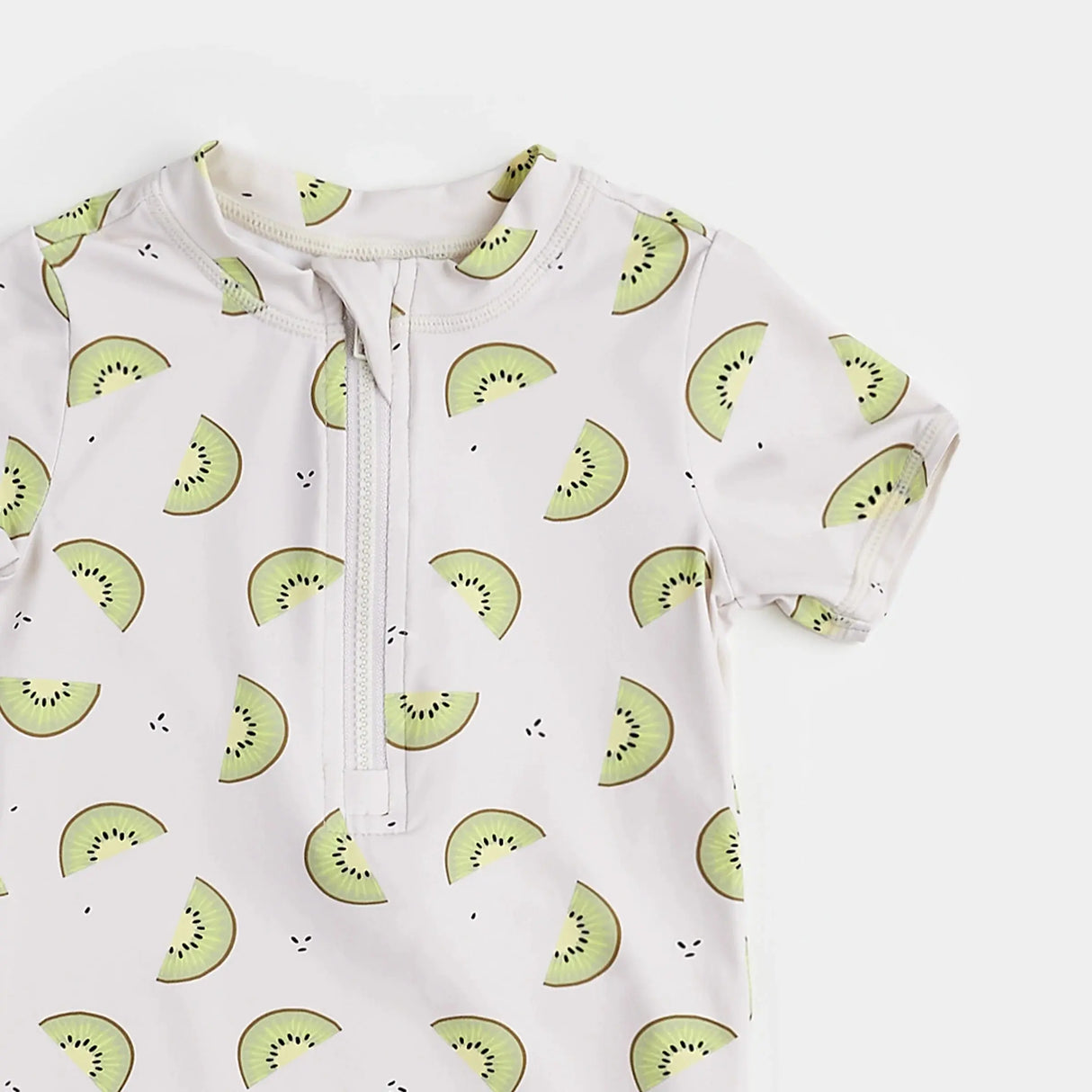 Kiwi Print On Crème Swim Romper | Petit Lem | Petit Lem | Jenni Kidz