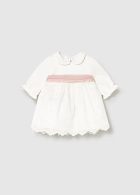 Front view of ivory Mayoral newborn girl embroidered dress with pink sash