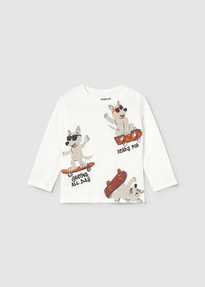 Front view of ivory baby boys T-shirt with skateboarding dog graphics