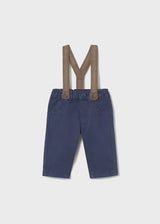 Front flat lay of newborn navy baby pants with Tan detachable suspenders.