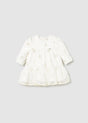 Front view of Ivory/Gold dot tulle baby dress with long sleeves and gathered skirt.