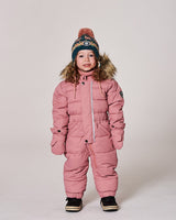 Model in one-piece pram suit pink with fleece-lined hood — almost gone