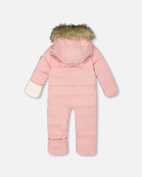 Back view of pink car-seat snowsuit with hood trim and quilting.