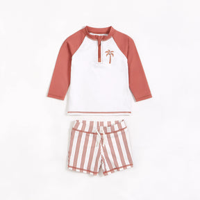 Petit Lem white and red palm-tree rashguard with striped swim shorts, front