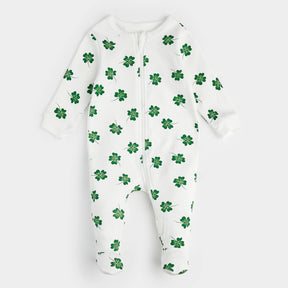 Petit Lem off-white footed baby sleeper with green clover print, front view