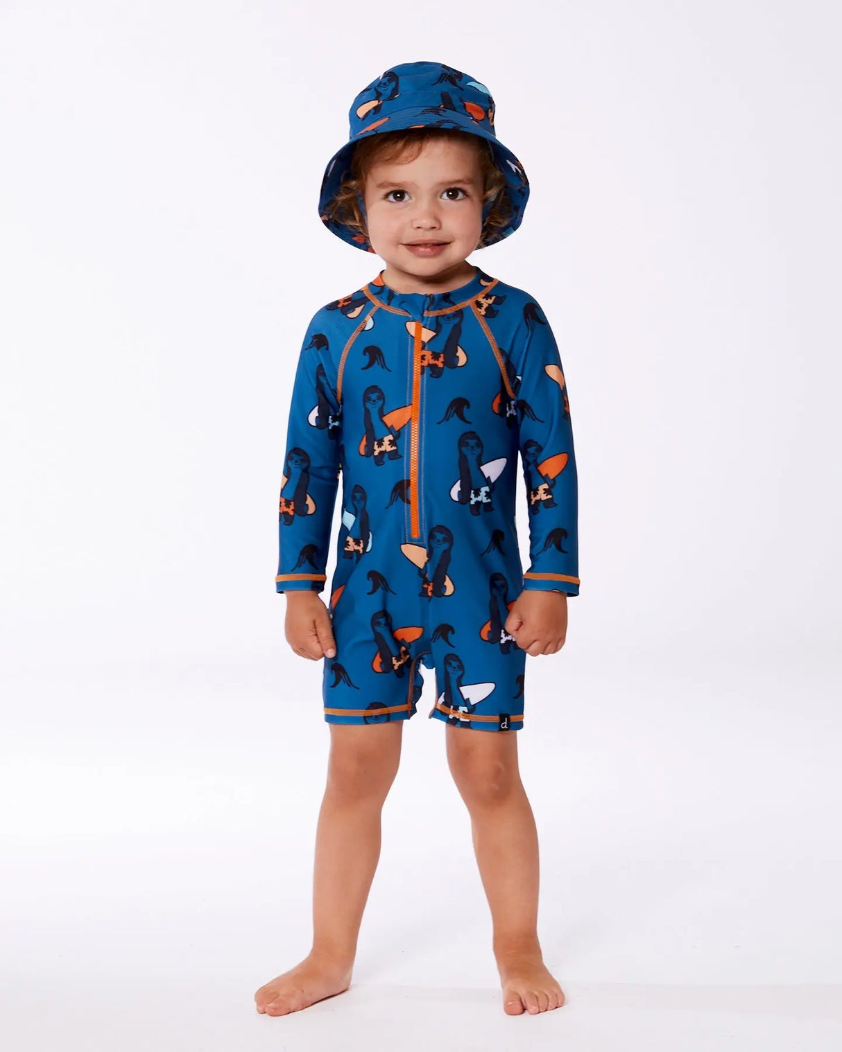 Printed Long Sleeve One-Piece Rashguard Orange Sloths On Navy Blue | Deux par Deux | Jenni Kidz