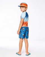 Printed Swim Trunks Orange Sloths On Navy Blue | Deux par Deux | Jenni Kidz