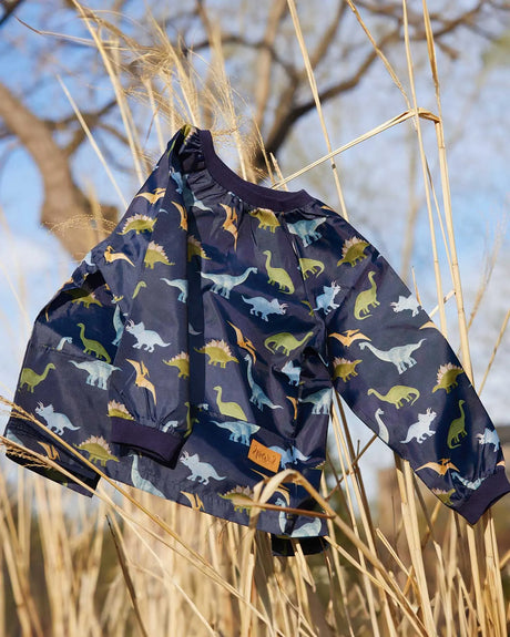 School Apron Navy Blue Printed Dinosaurs | Deux par Deux | Jenni Kidz