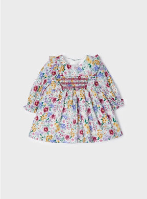Front view of baby girls multicolour floral smocked dress