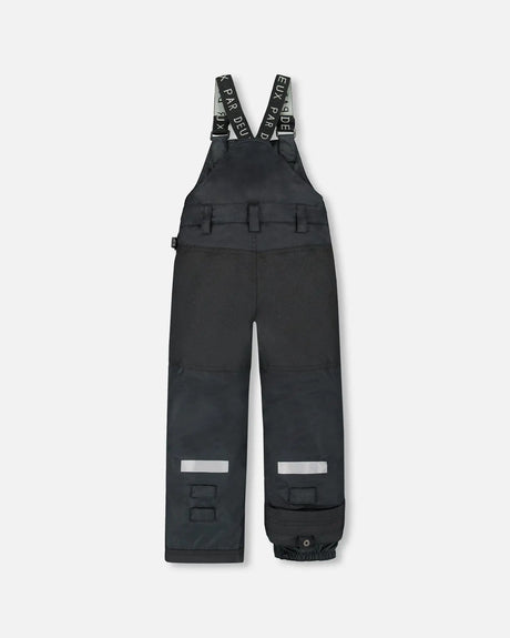Back view of Solid Black snow overalls with elastic waistband.
