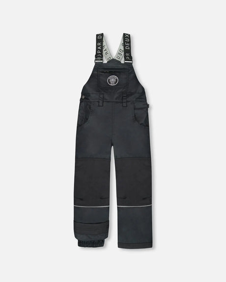 Flat lay of boys Solid Black snow bib overall with reinforced knees.
