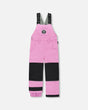 Girls snow bib in purple/black with Cordura knee panels, front view.