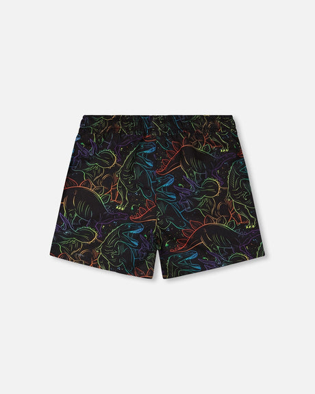 Back view of black dinosaur print swim trunks for boys