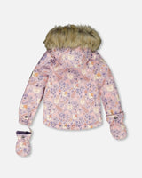 Back view of purple printed jacket with faux-fur hood, two-piece ski suit.