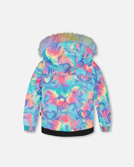 Back view of multicolor jacket with faux-fur hood — two-piece ski suit.