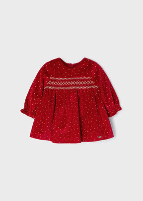 Mayoral baby girl red velvet dress with polka dot pattern, shirred waist, and long sleeves.