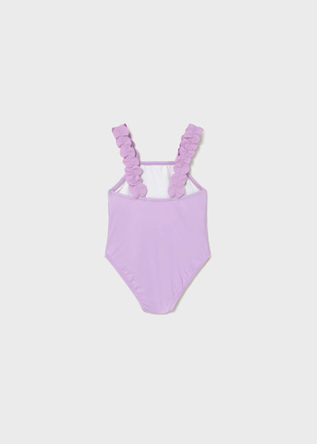Back view of Mayoral baby girl Lilac one-piece swimsuit with stretch swim fabric.