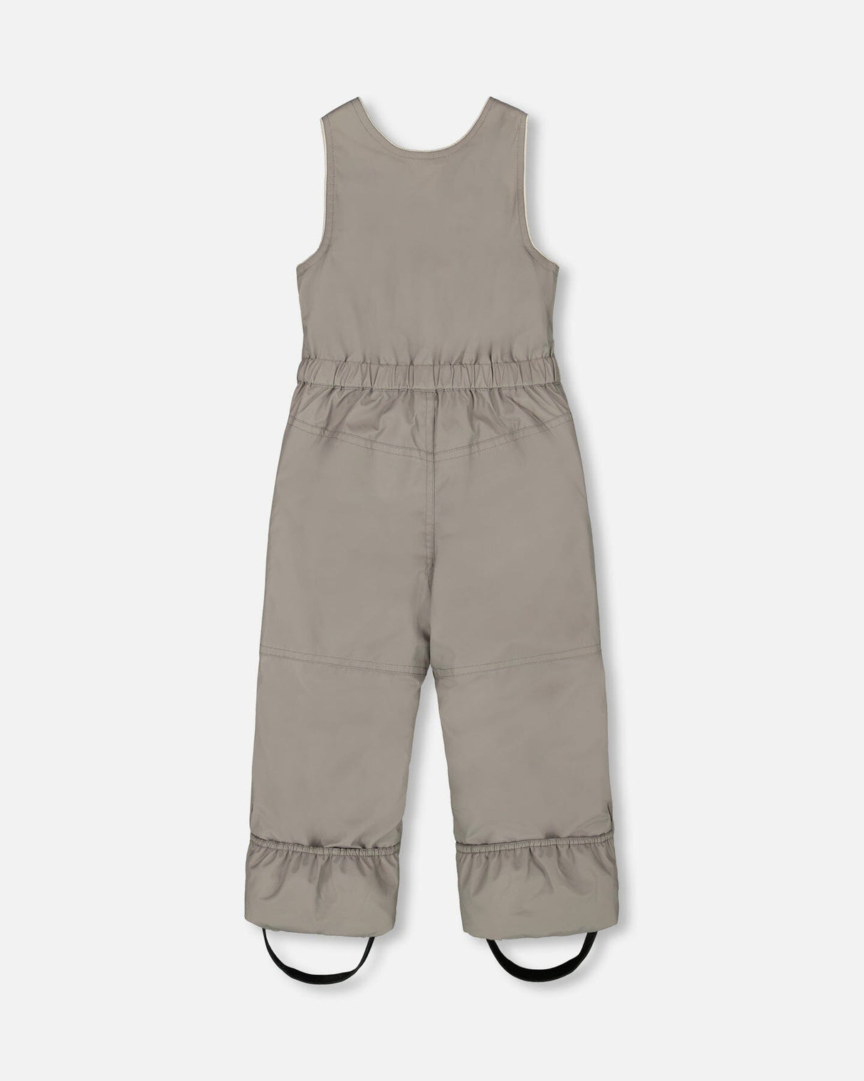 Close-up of bib pants with elastic ankle snow guards and boot straps