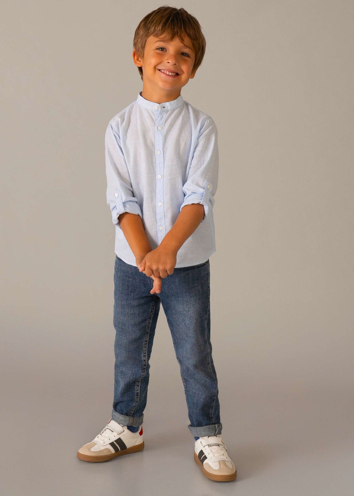 Boy standing in Mayoral Blue jeans showing regular fit and easy everyday styling.