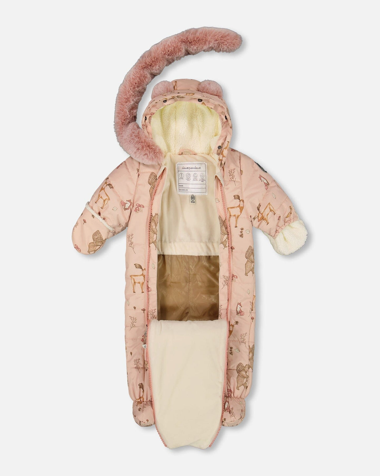 Lifestyle photo of a baby wearing the pink animal print car seat–compatible snowsuit