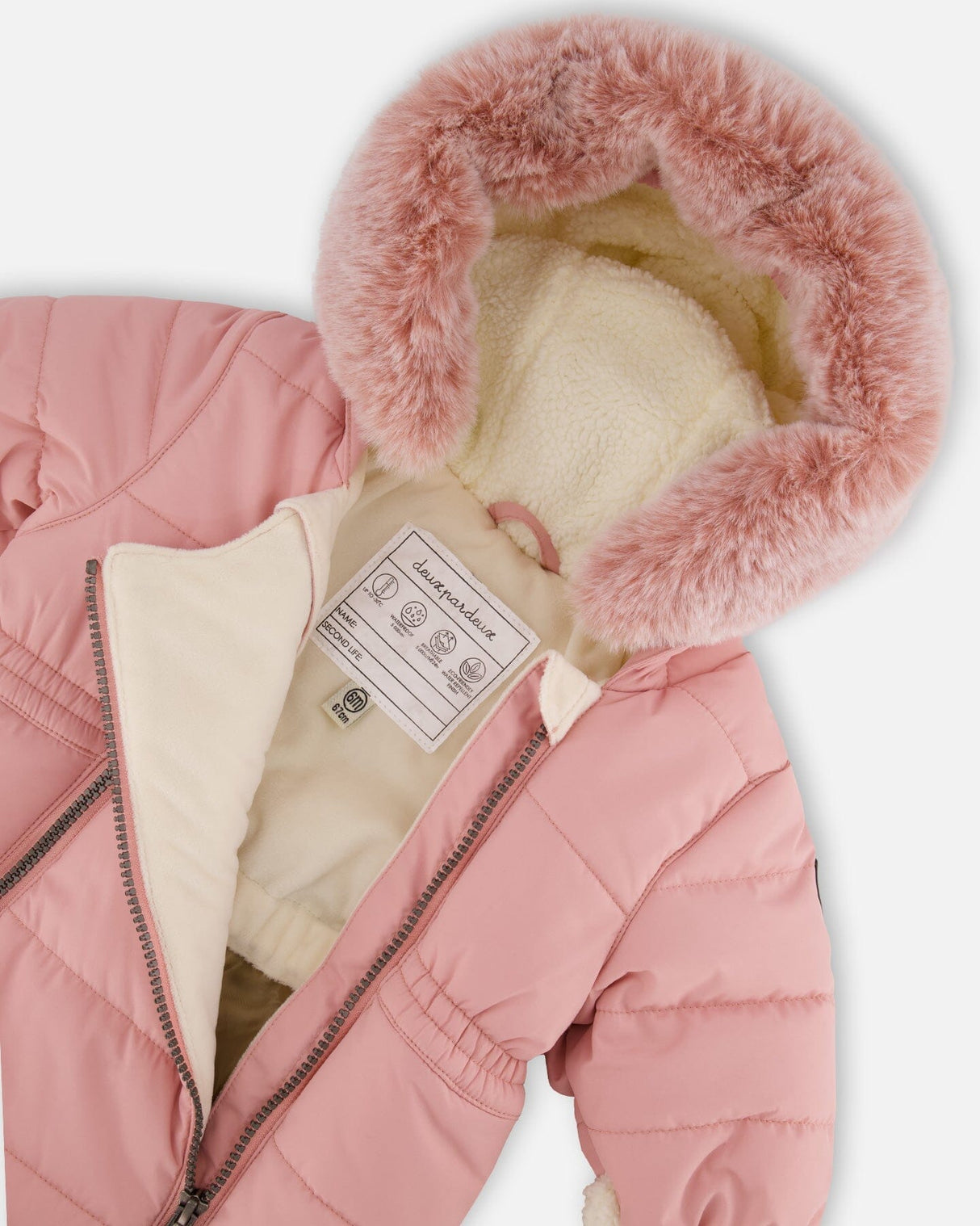 Close-up of sherpa hood and velour lining dusty pink snowsuit