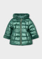 Metallic green hooded puffer coat laid flat with faux fur hood trim and fur cuffs