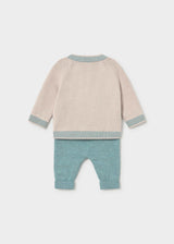Back view of the Mayoral newborn beige knit sweater and mineral green pants set