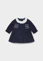 Mayoral baby girl navy polka dot dress with pleated ivory collar and white smocking, front view