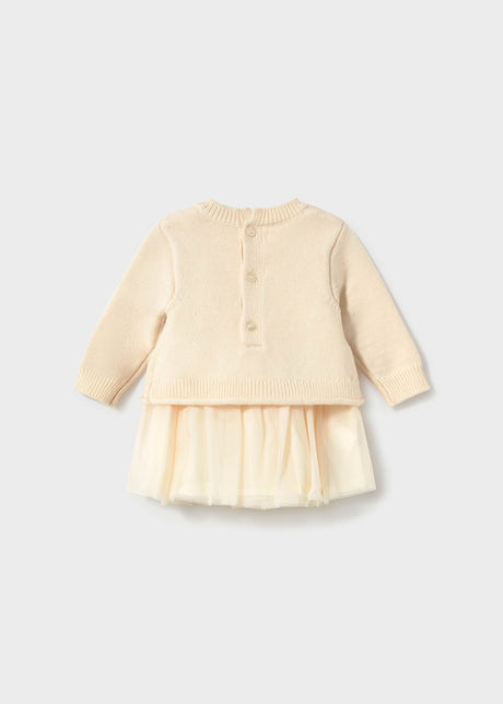 Back of the cream Mayoral knit dress with button closure and tulle skirt
