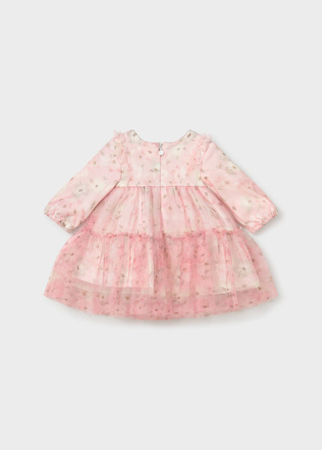 Back view of the pink floral tulle dress with long sleeves and a zip down the back