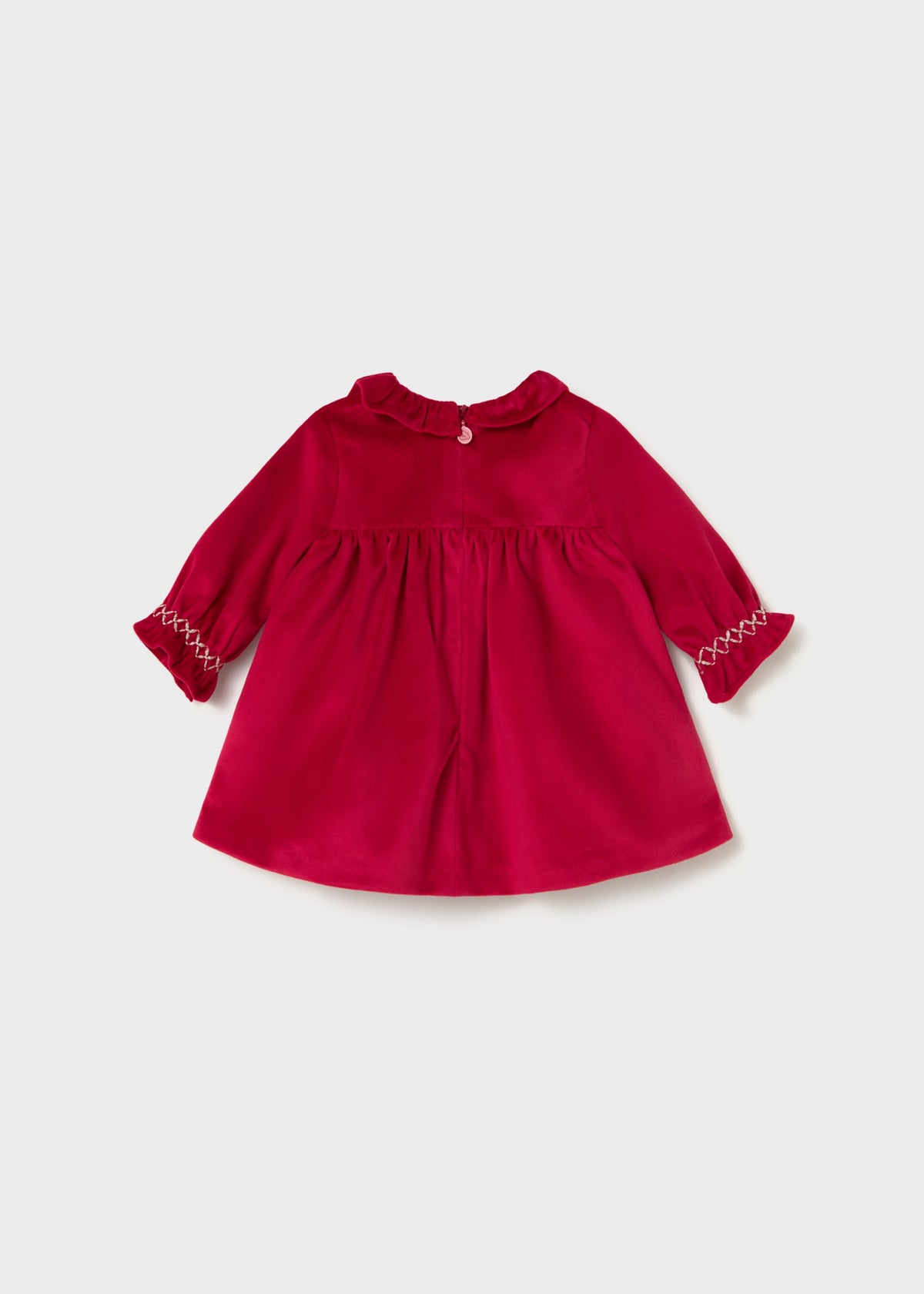 Back view of the red velvet dress with frilled collar and back zipper
