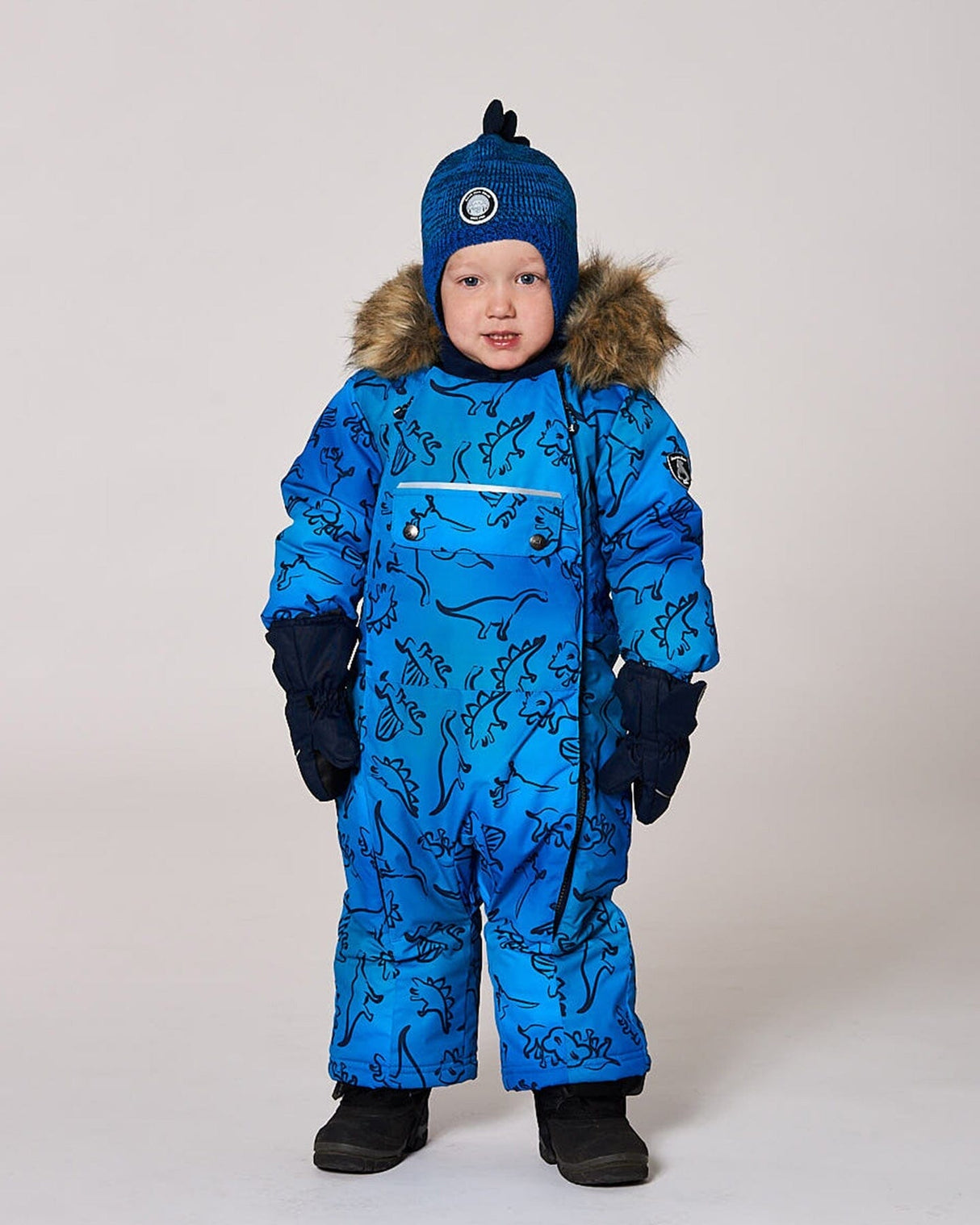 Close-up detail of waterproof zipper and chin guard on the Deux par Deux dinosaur snowsuit