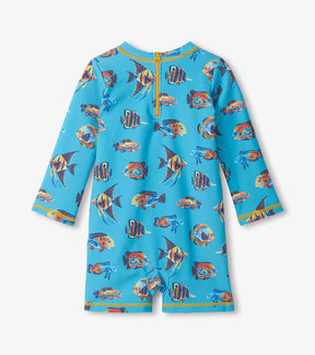 Back view of baby boy one-piece ocean-print swimsuit showing zipper detail and full tropical pattern.