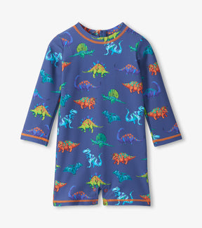 Hatley baby boy UPF50+ rashguard swimsuit in Navy Blue with colorful Dino Party print and long sleeves.