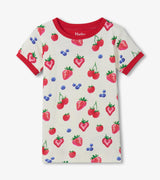 Front view of girls berry-print cotton pajama top with Red trim and short sleeves.
